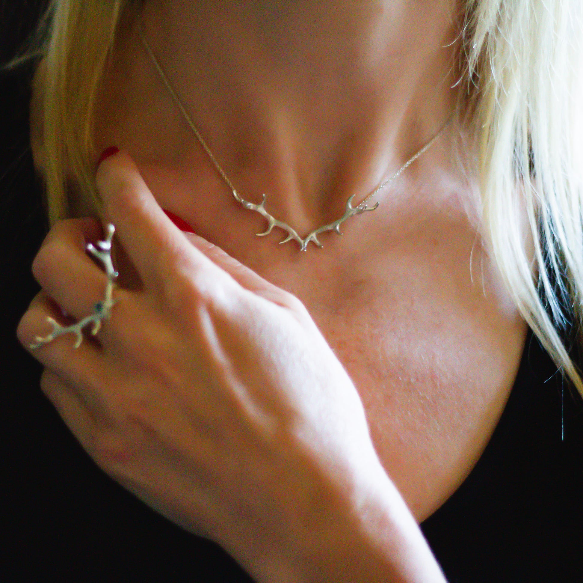 mini antler pendant on a fine chain. made in sterling silver